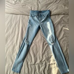 Women’s express jeans ripped at the knees